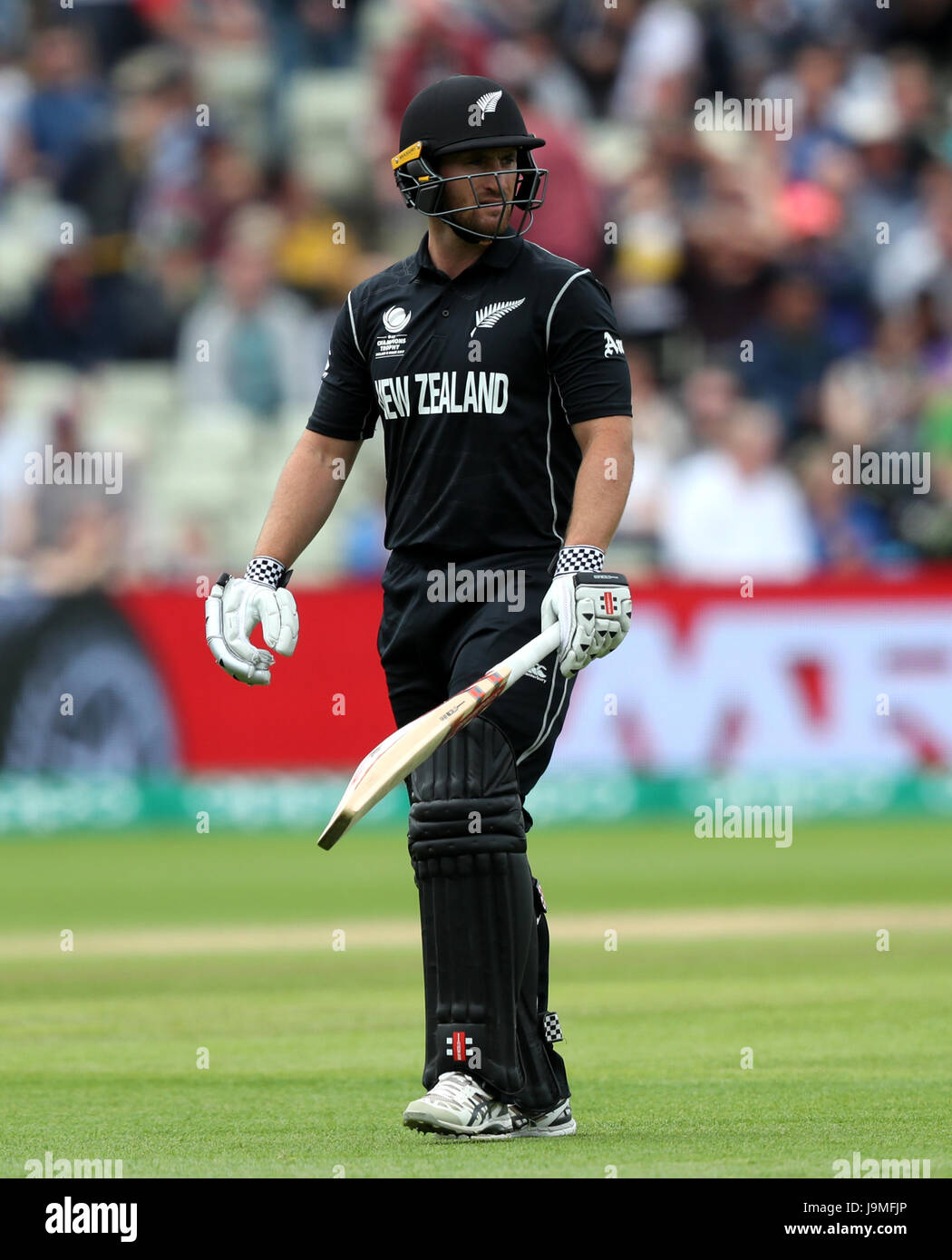 New Zealand's Neil Broom walks off after being dismissed by Australia's Josh Hazelwood during the ICC Champions Trophy, Group A match at Edgbaston, Birmingham. Stock Photo