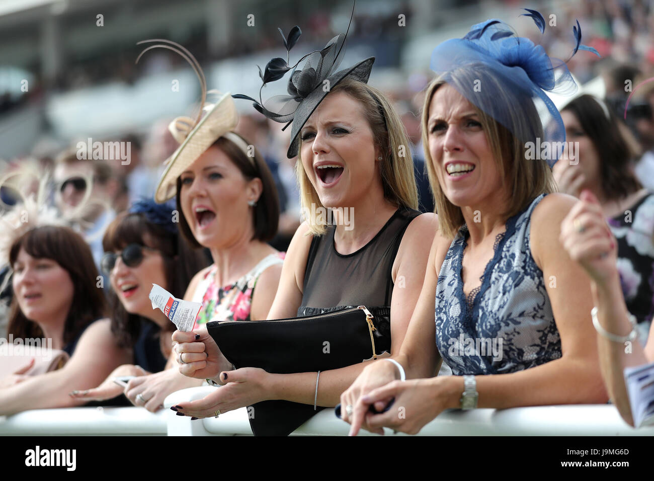 Women's Day Racers Female racegoers cheer on the racing action on Ladies Day during the ...