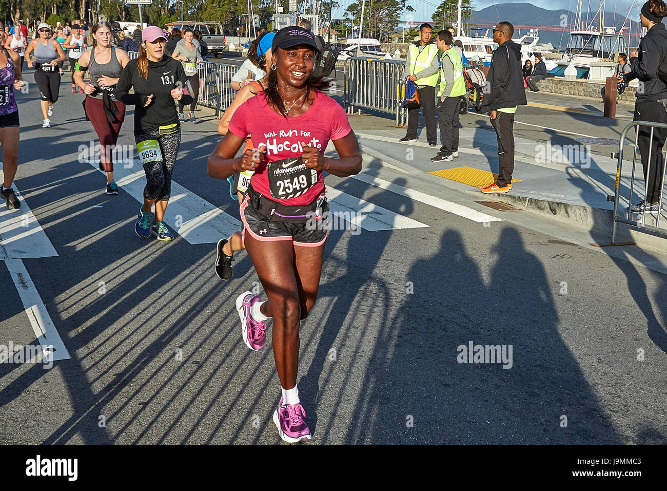 Happy African American Athlete Approaching The Finish Line In The Nike  Woman's Half Marathon, San Francisco Stock Photo - Alamy