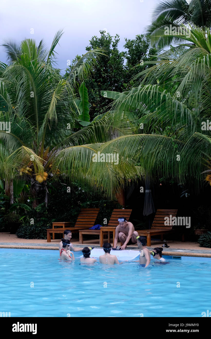 The swimming pool at the Coco Grove Beach Resort in the island of Siquijor located in the Central Visayas region of the Philippines Stock Photo