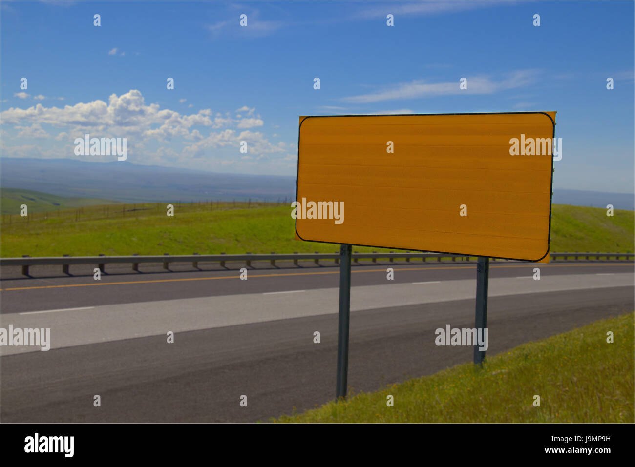 Blank Yellow Rectangular Sign on the edge of a Motorway Stock Photo