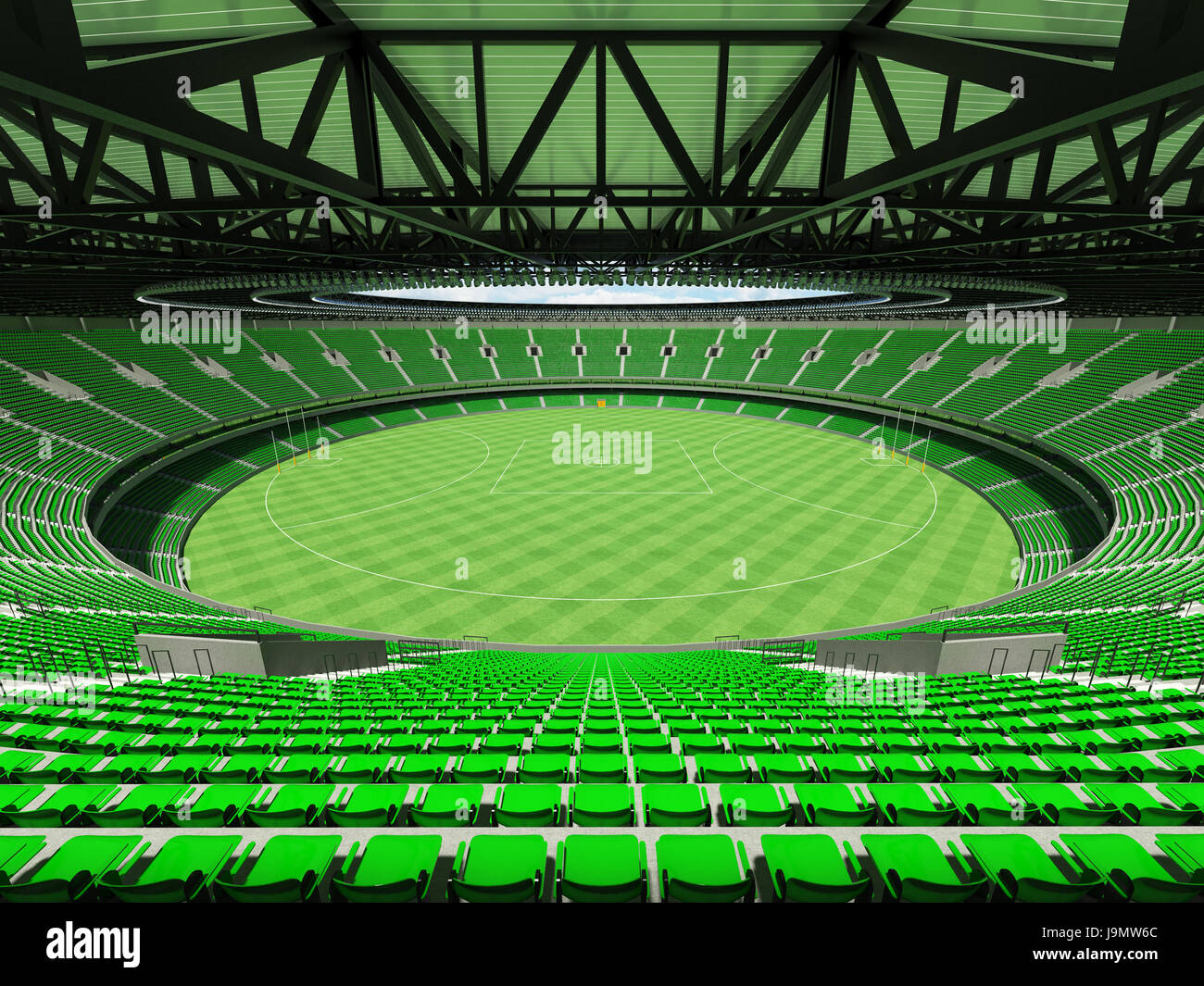 3D render of a round Australian rules football stadium with  green seats and VIP boxes for fifty thousand fans Stock Photo