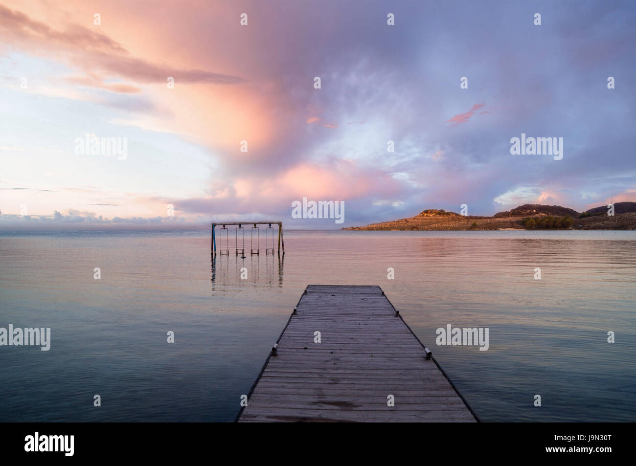 view on Sevan lake pier sunset in summer day Stock Photo