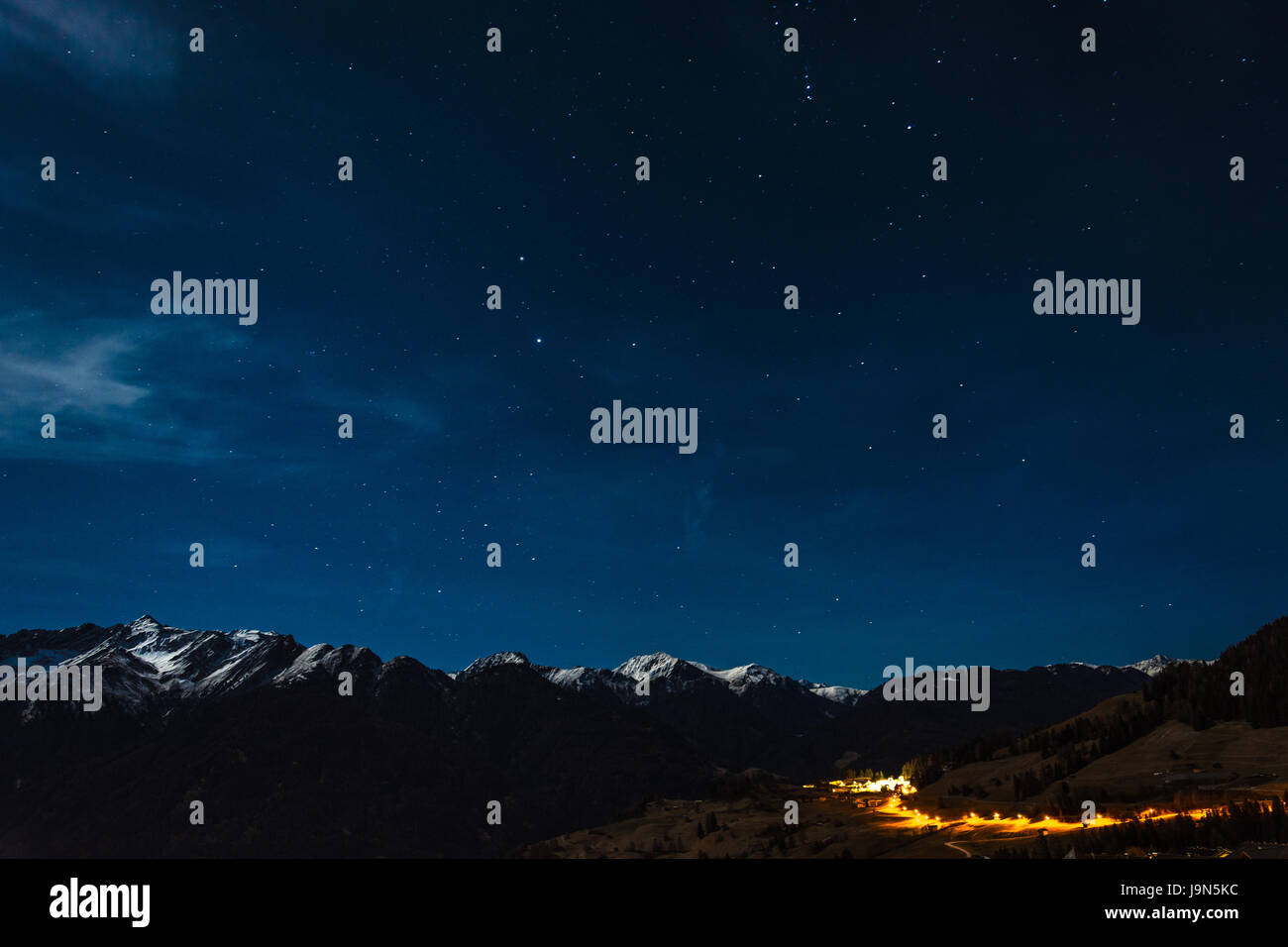 Stars over snowy mountains in Austria Stock Photo