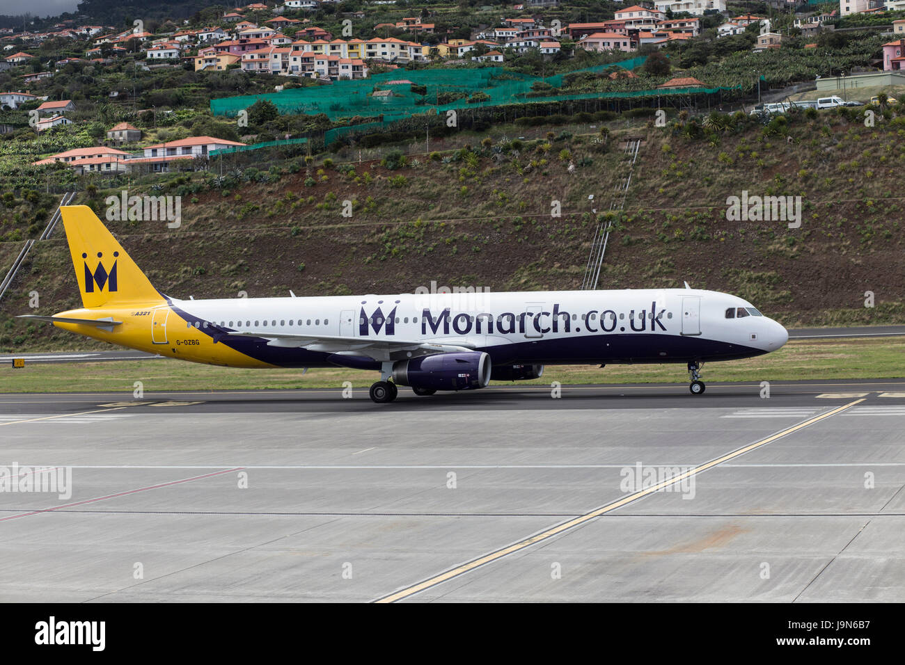 Monarch Airlines Airbus A321 taxi-ing at Madeira Airport, near Fuchal, recently renamed Christiano Ronaldo International Airport Stock Photo