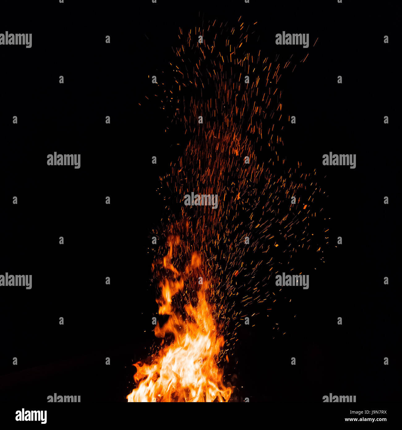 Campfire with flying sparks isolated on black background Stock Photo ...