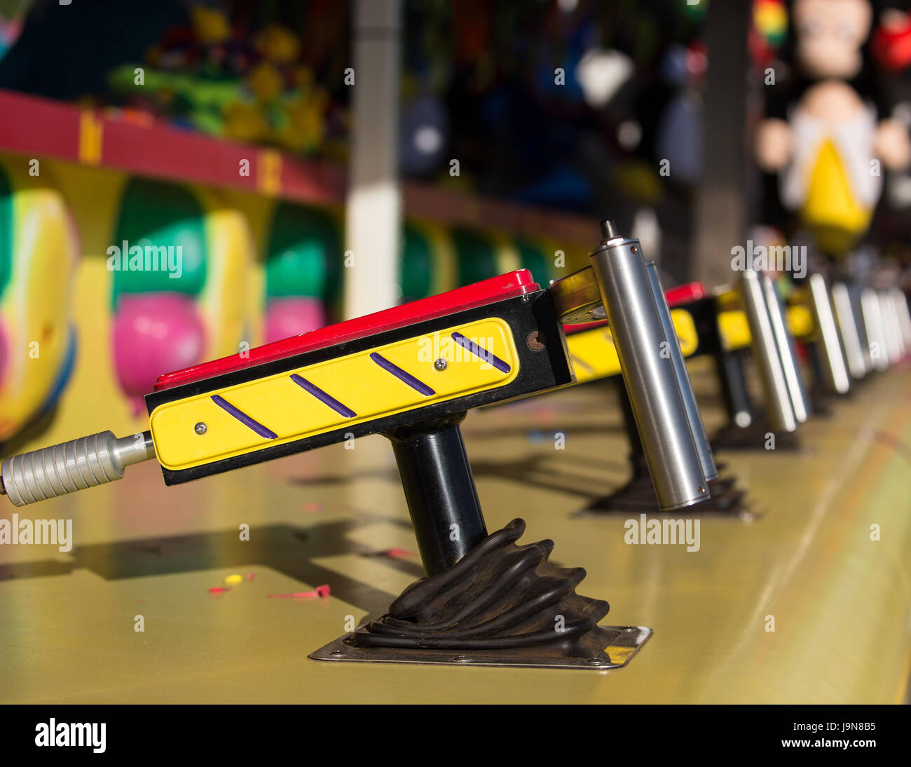Squirt gun game on the midway of a county fair Stock Photo Alamy