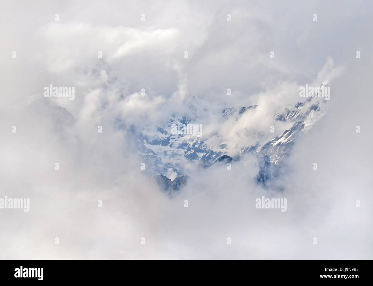 Mountain above clouds hi-res stock photography and images - Alamy