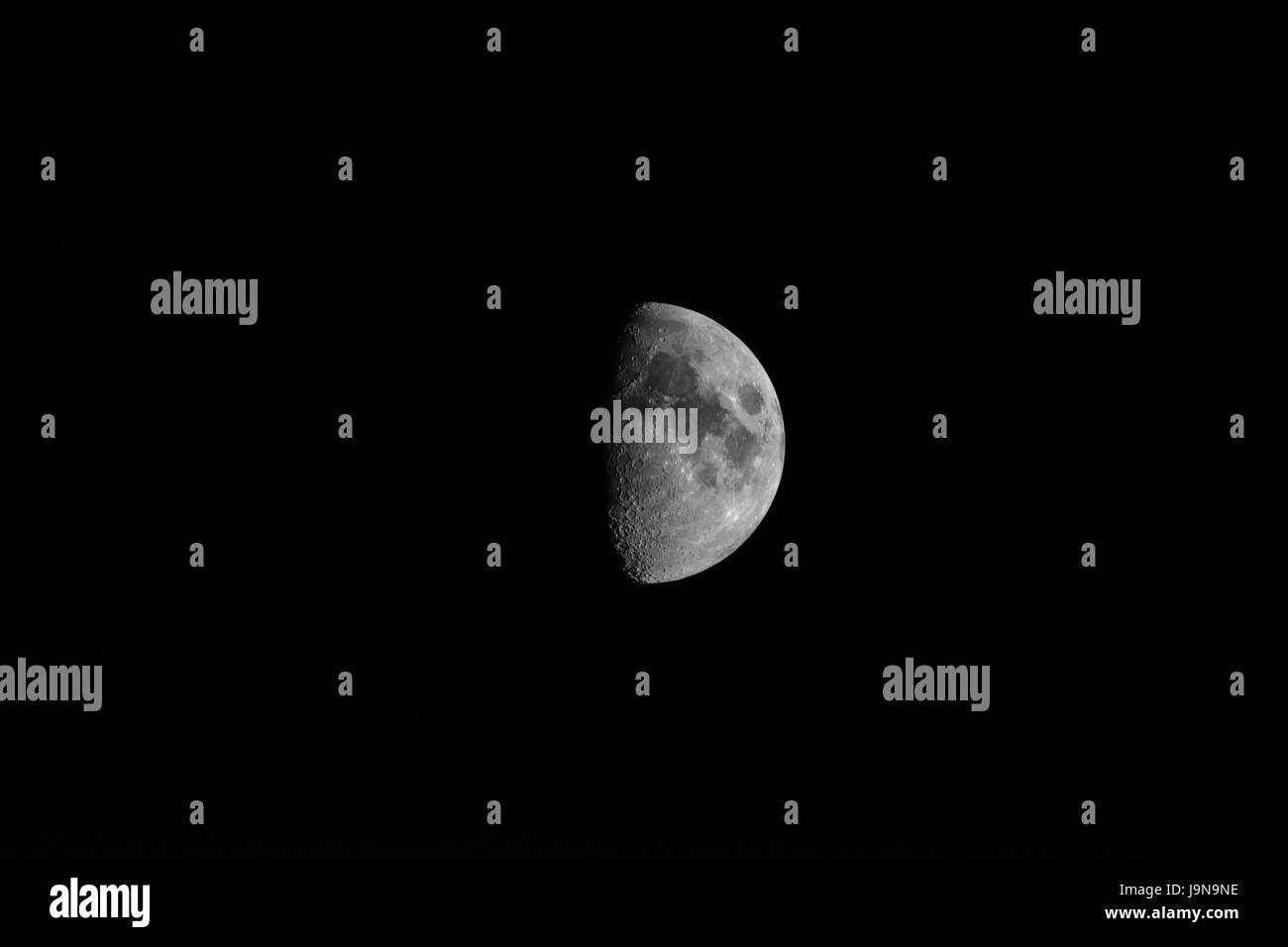 First Quarter Phase of the Moon Stock Photo Alamy