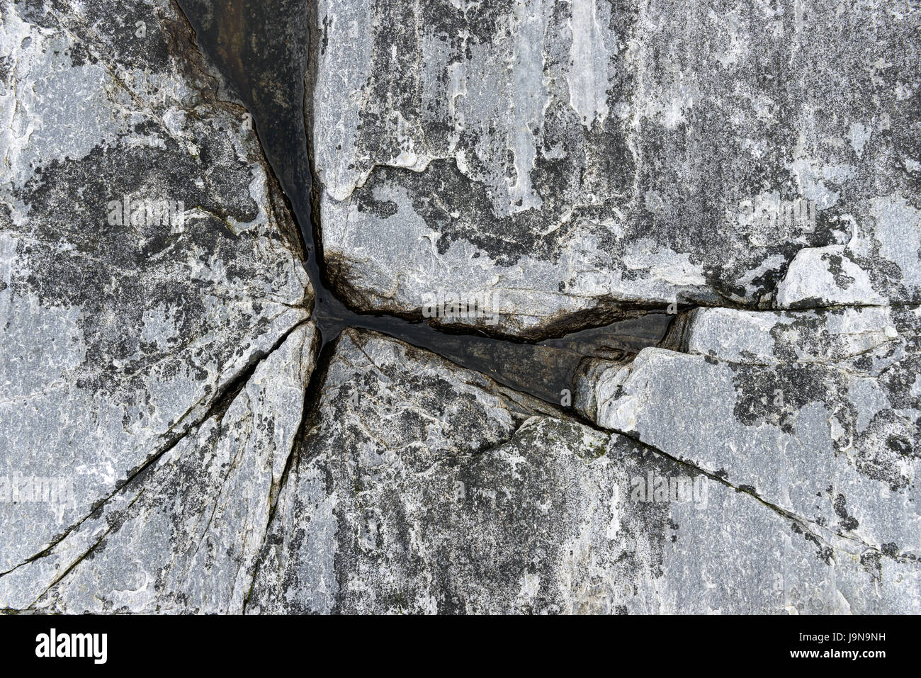 Close-up of cracks in a cliff. Straumhella, Kvaløya, Tromsø, Norway. Stock Photo