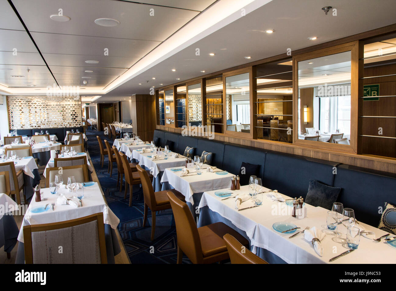 The Restaurant is Viking Sea's airy and coimfortable main dining room, featuring a daily-changing menu highlighting local cuisine. Stock Photo