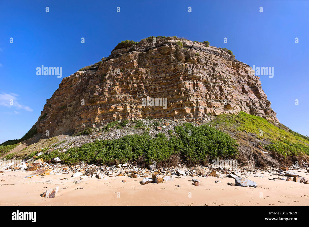 Nobbys Tuff Rocks Nobbys beach in Newcastle, New South Wales, Australia Stock Photo - Alamy