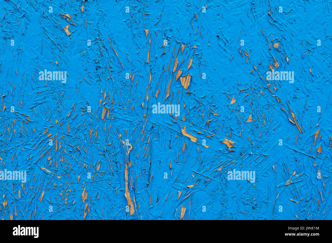 Blue painted chipboard texture. Construction panel. Shabby paint