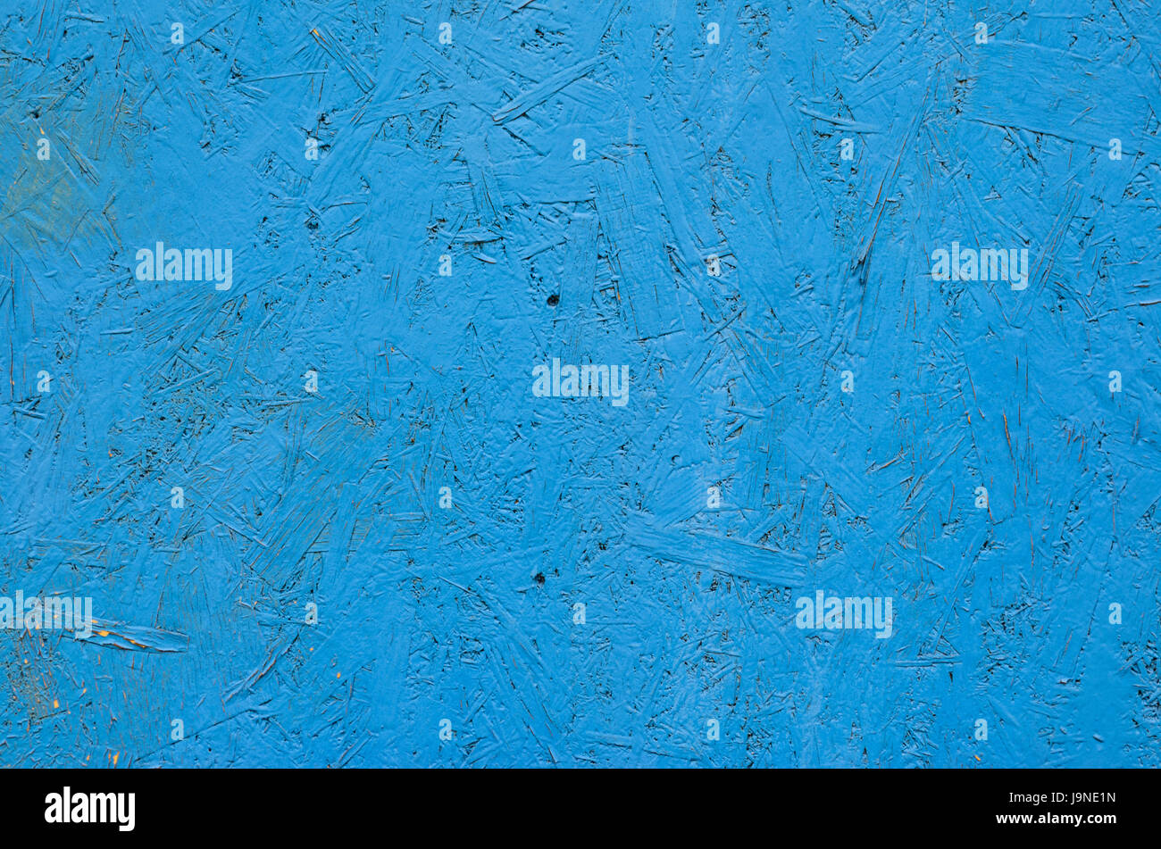 Blue painted chipboard texture. Construction panel. Paint wood