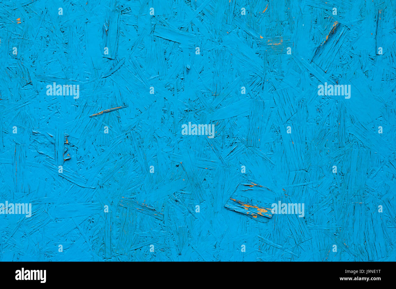 Blue painted chipboard texture. Construction panel. Paint wood