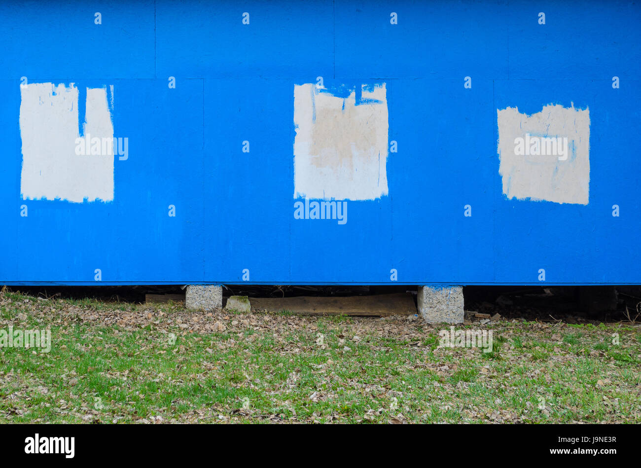Blue painted chipboard texture. Construction panel. Paint wood