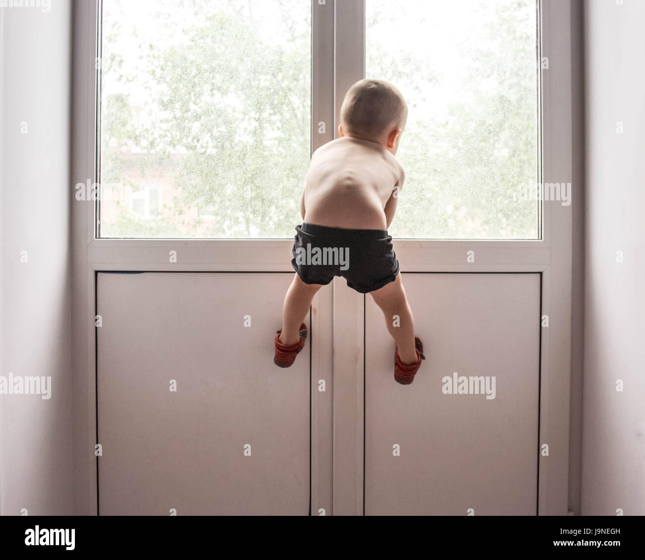 Baby escape from home. Photo for your design. Stock Photo