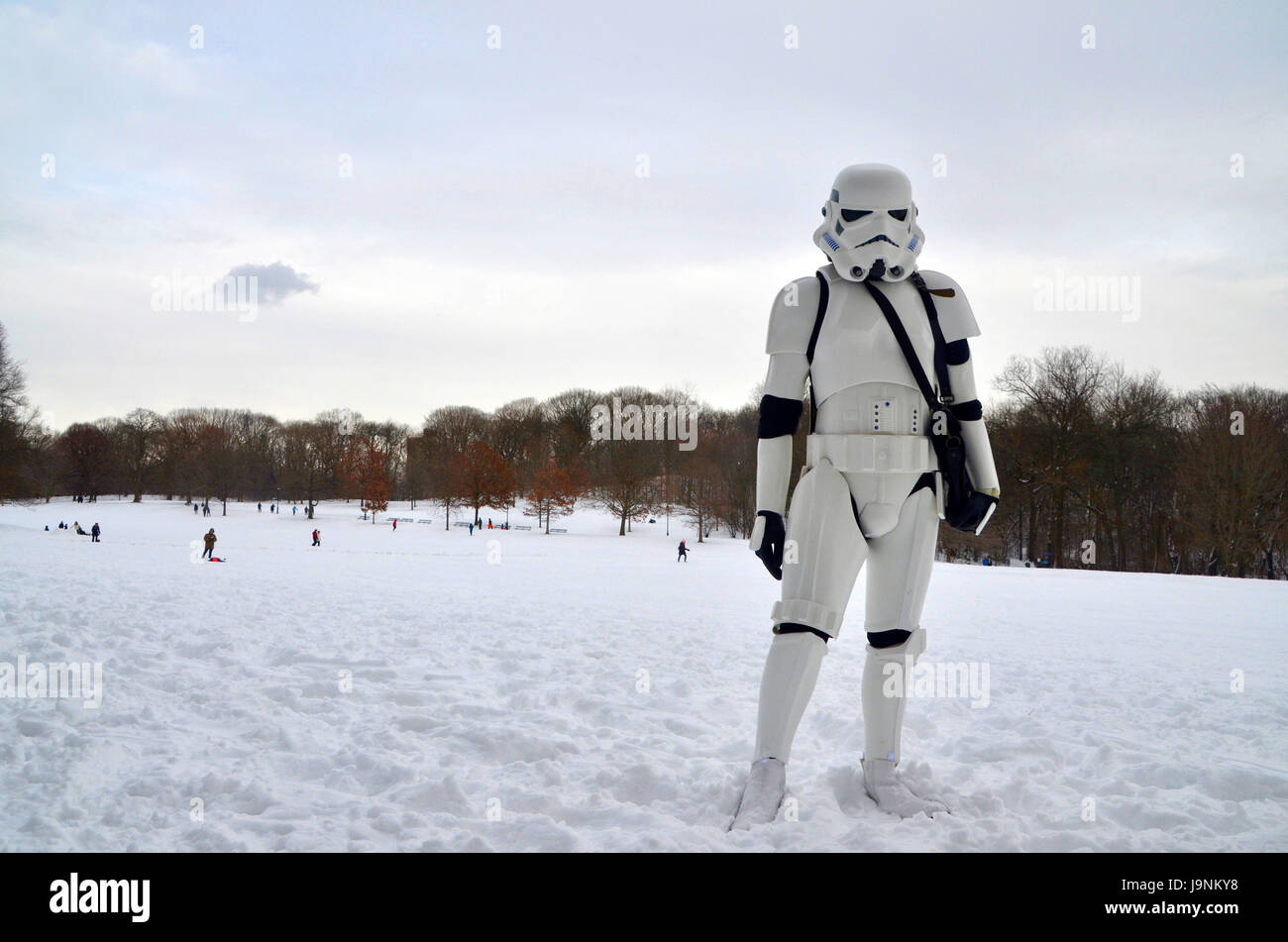 a man dressed as a star wars stormtrooper in the snow at prospect park brooklyn USA Stock Photo