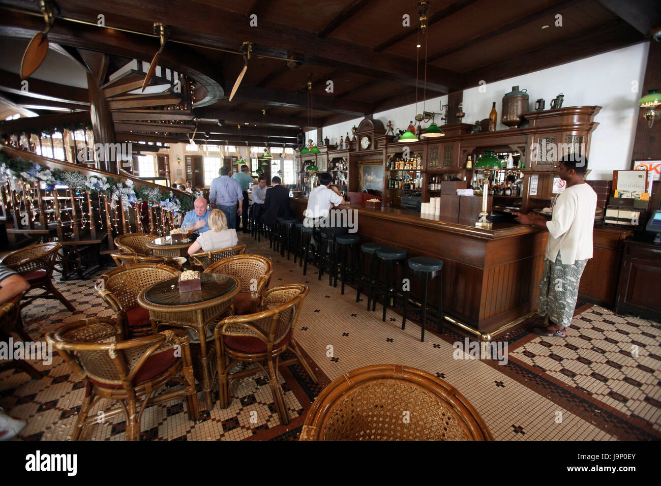 Singapore,island,town,restaurant,hotel,bar,architecture,Colonial,Raffles,Long Bar,guests, Stock Photo