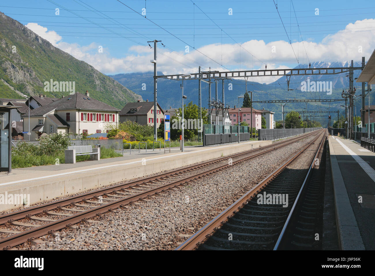 Electrified railway tracks. Vernayaz, Martigny, Switzerland Stock Photo