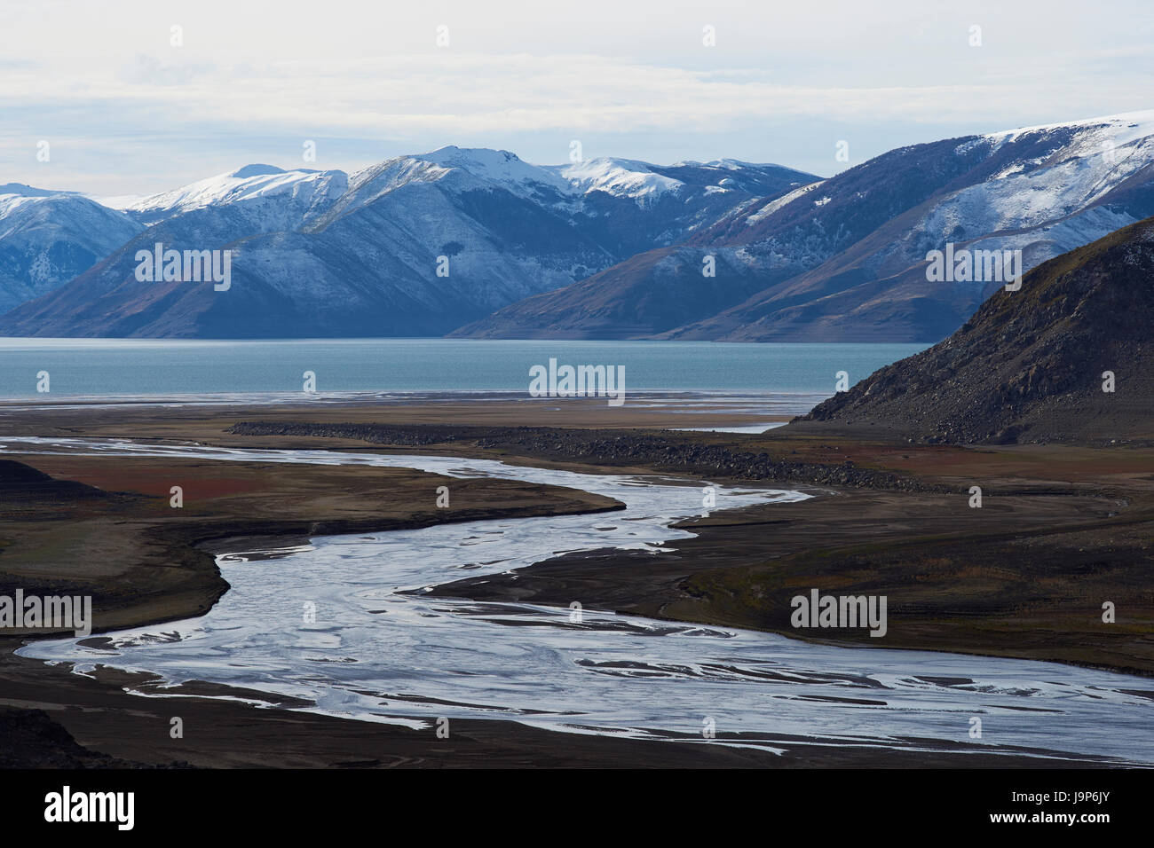 Mountain river flowing into Laguna de Laja in Laguna de Laja National Park in Bio Bio region of Chile. Stock Photo