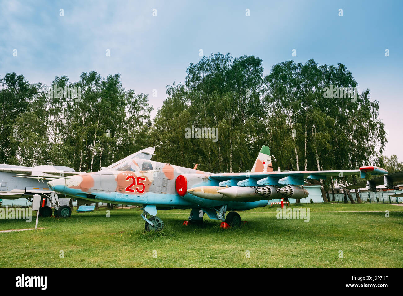 Russian Soviet Armoured Military Subsonic Attack Aircraft Fighter-bomber Stands At Aerodrome. Plane Designed To Provide Close Air Support For Troops I Stock Photo