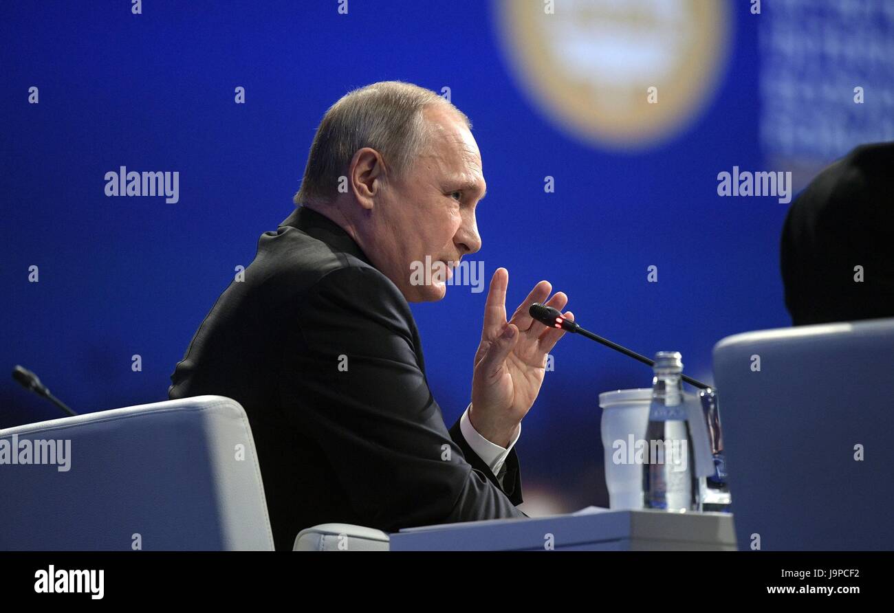 Russian President Vladimir Putin answers questions during the St. Petersburg International Economic Forum June 2, 2017 in St Petersburg, Russia. Stock Photo