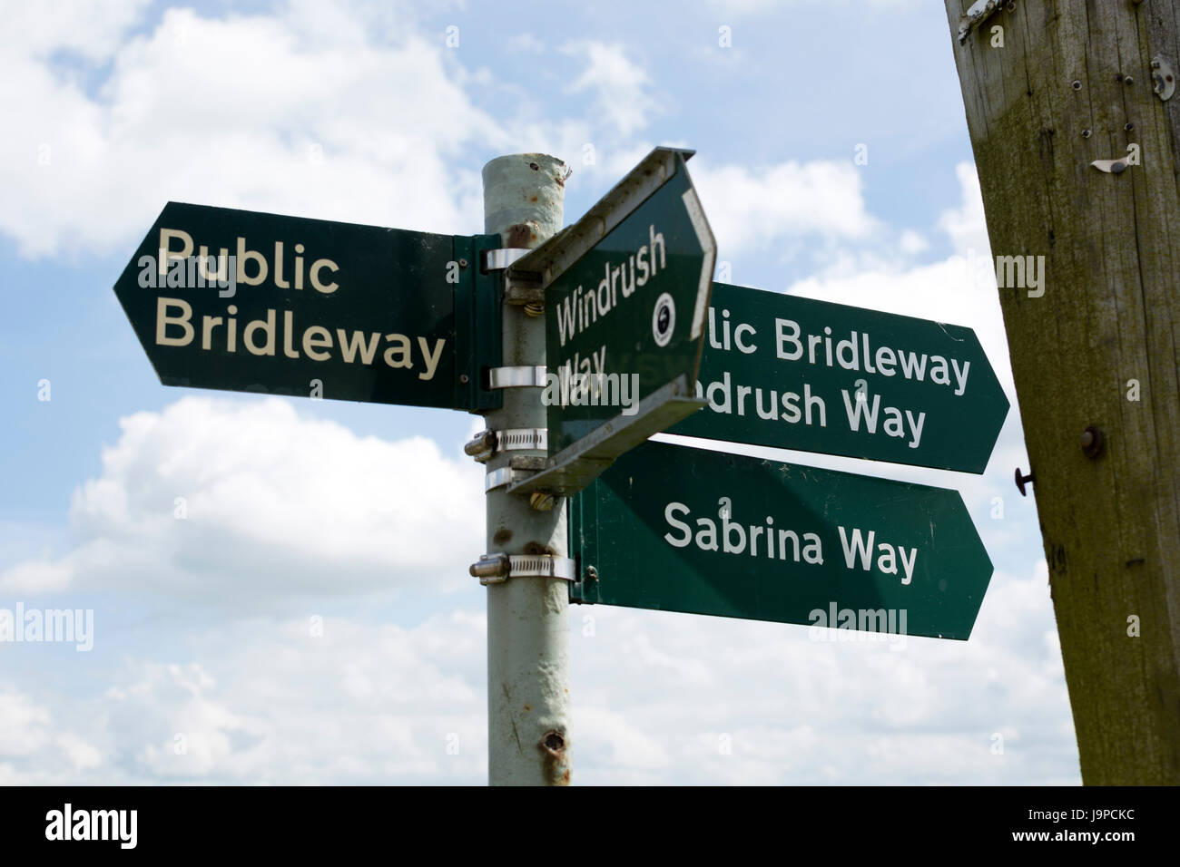 Bridleway and footpath signpost in the Cotswolds, Gloucestershire, England, UK Stock Photo