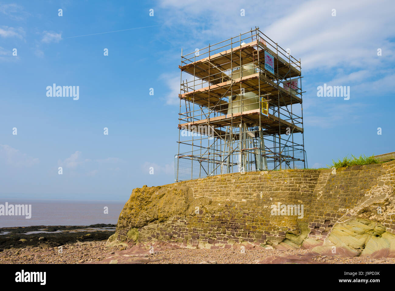 Black Nore Lighthouse surrounded by scaffolding during repainting. Portishead, North Somerset, England. Stock Photo