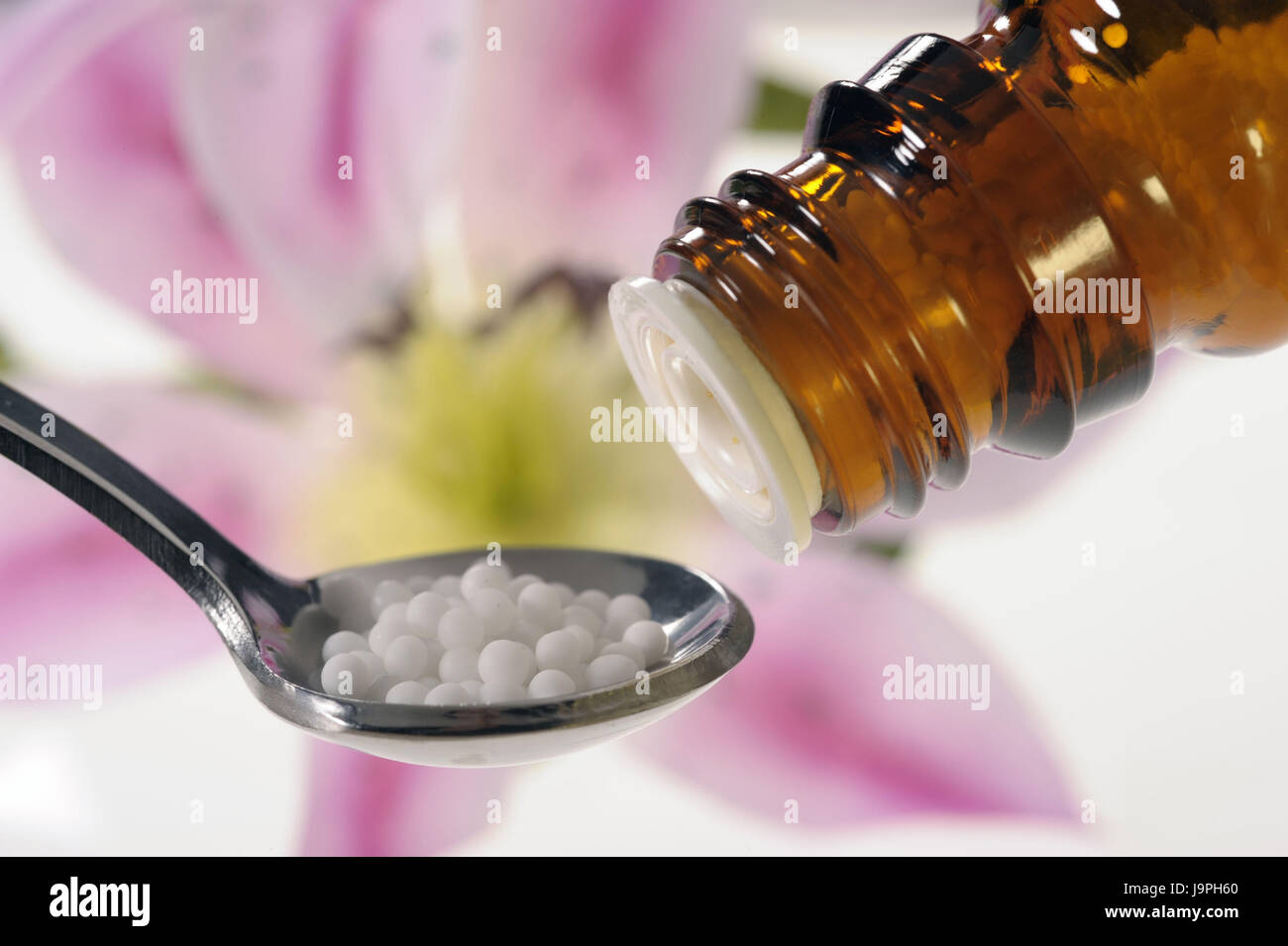 Nature medicine,homoeopathy,spoon,Globuli,vegetable active ingredients, Stock Photo