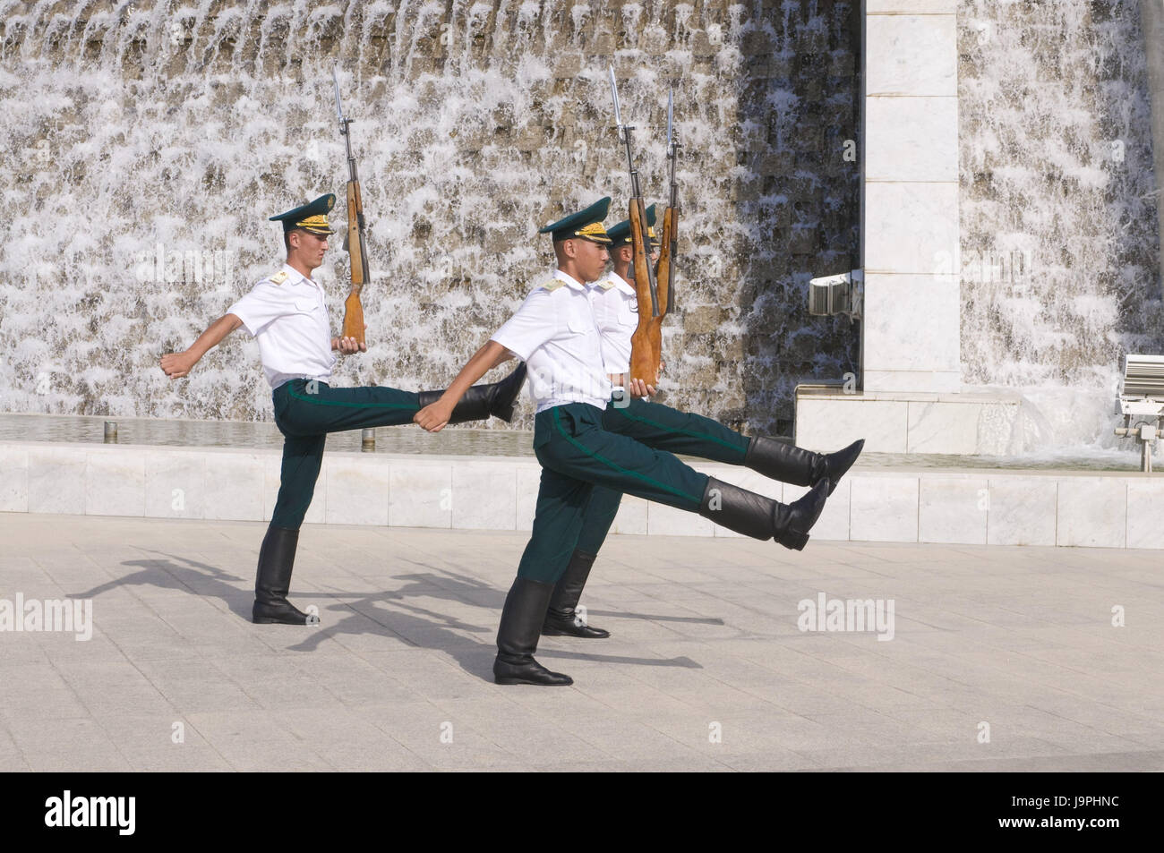Guards before the independence monument,Ashgabad Stock Photo - Alamy