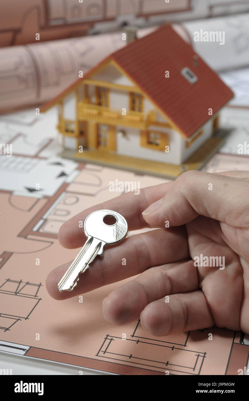 Architecture,architect's plan,model house,hand,key Stock Photo Alamy