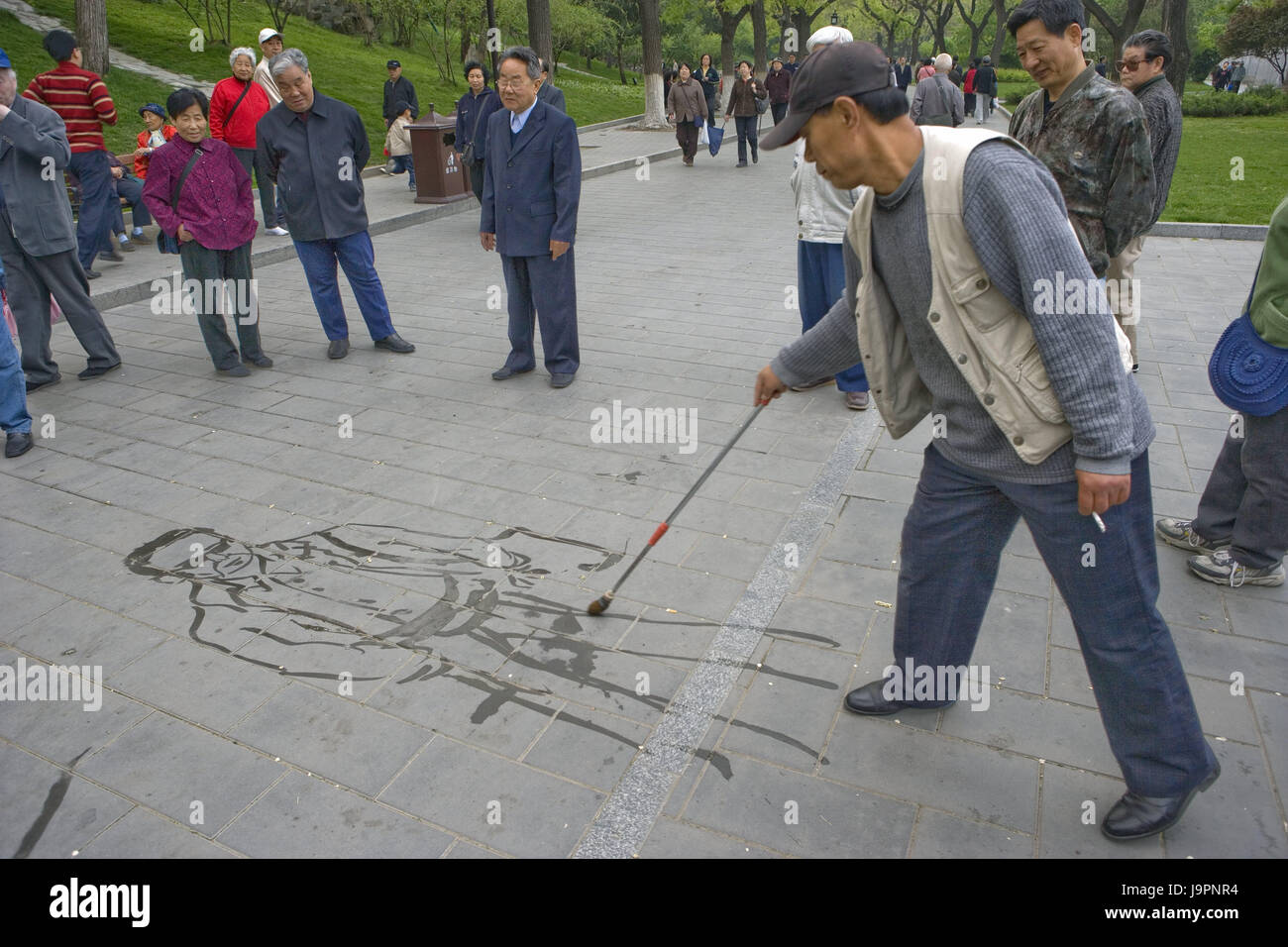 China,Peking,Beihai park,man,brush,subscription,tourist,no model release,Asia,Eastern Asia,town,capital,destination,culture,park,island,person,visitor,place of interest,outside,leisure time,hobby,art,artist,skilfully,transient,person,paint,water, Stock Photo