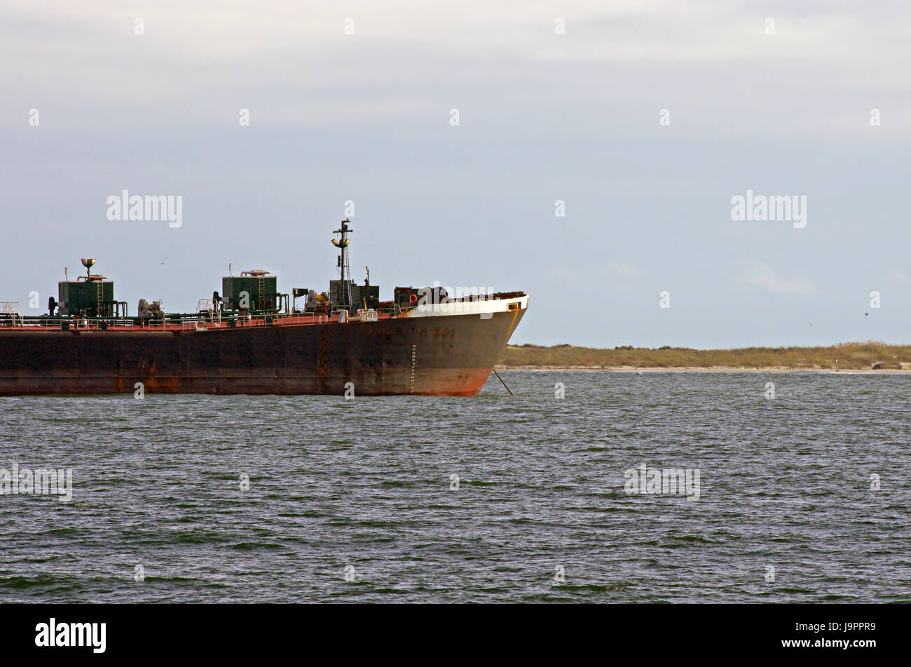 Shipping Vessel Anchored off the Coast of Alabama in the Gulf of Mexico Stock Photo