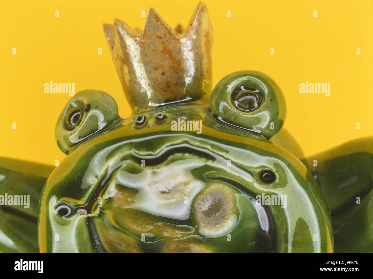 Ceramics character,frog prince,detail,decoration,Dekofigur,animal character,fairy tale character,character,frog,crown,glazed,green,curled,icon,fairy tale,enchants,execrated,prince, Stock Photo