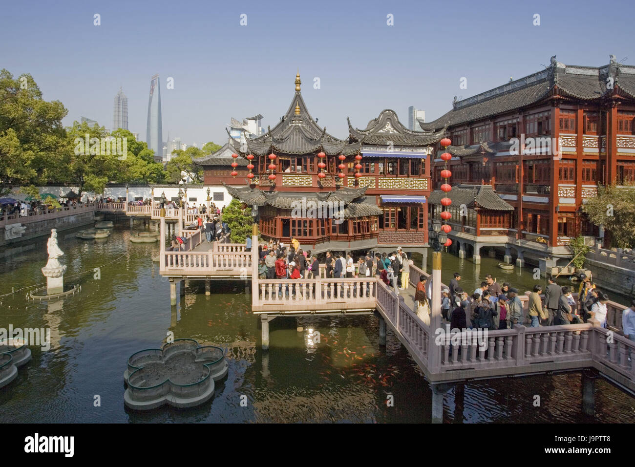 China,Shanghai,Old Town,Yu Yuan Bazaar,Teehaus-im-Herzen-des-Sees,Jiuqu Qiao bridge,tourist,Asia,Eastern Asia,town,city,part of town,Yu Gardens Bazaar,building,houses,architecture,traditionally,in Chinese,people,tourism,place of interest,outside,pond,lake,teahouse,zigzag,nine-flection bridge,Zick Zack bridge,historically, Stock Photo