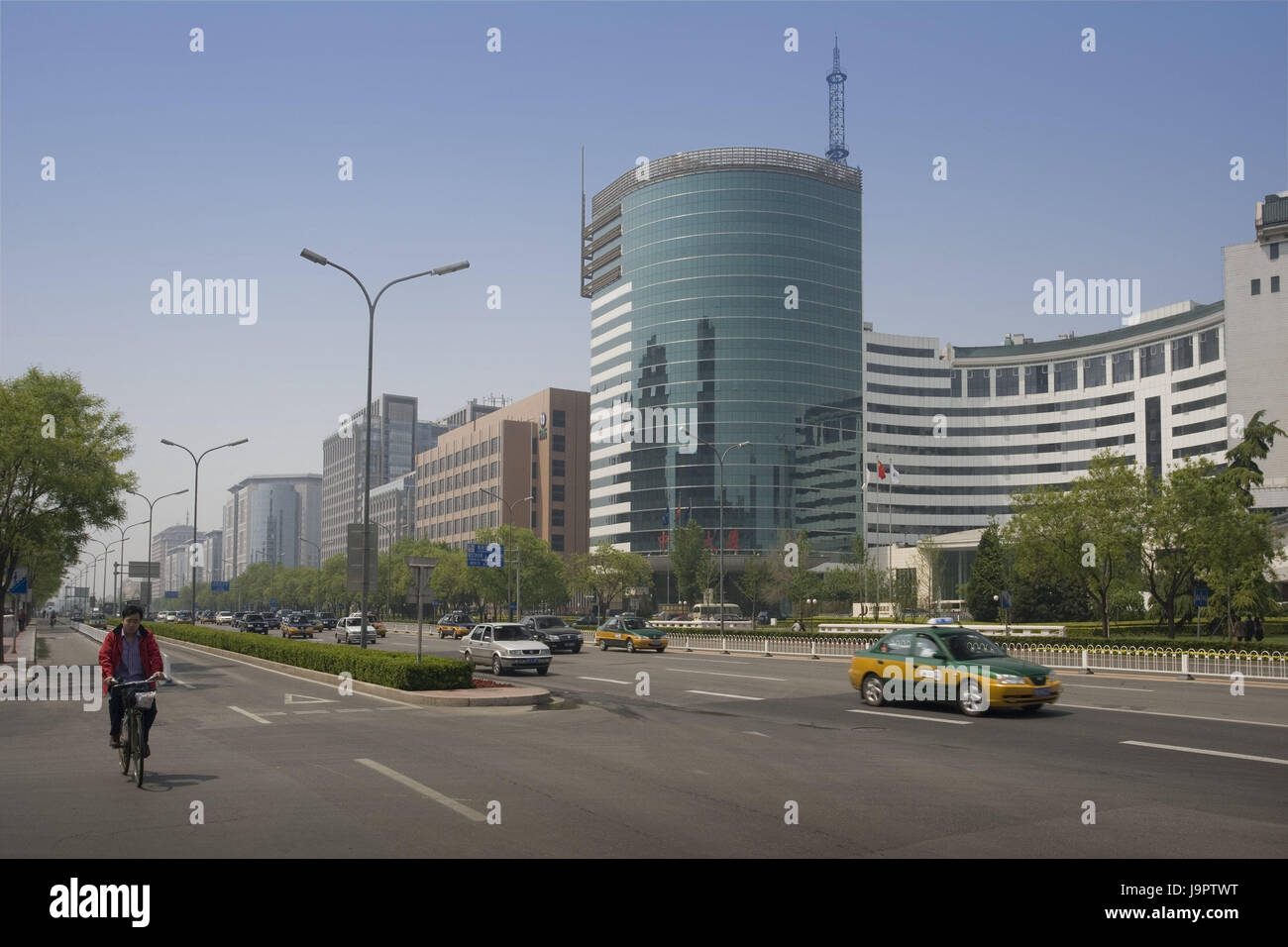 China,Peking,Jianguomennei Daijie street scene,Asia,Eastern Asia,town,capital,destination,building,architecture,office building,high rises,traffic,cyclist,cars,taxis,traffic,multi-lane, Stock Photo