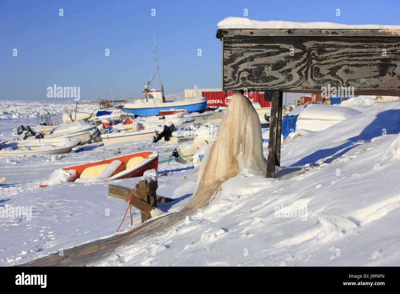 Greenland,Qaanaaq,local view,harbour,boats,sewage,froze, Stock Photo