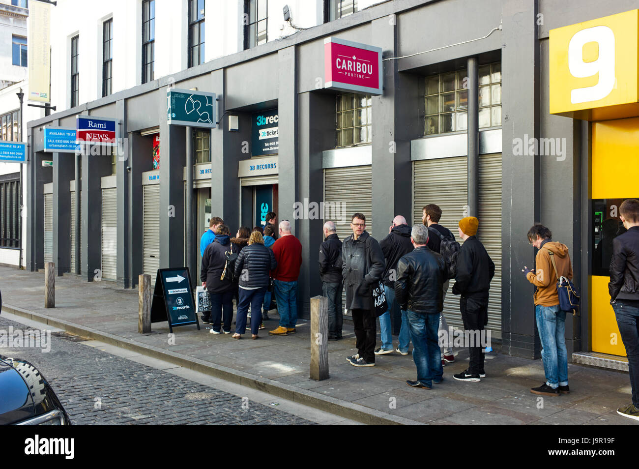 Queue of people outside 3b Records vinyl record shop in Bold Street area of Liverpool Stock Photo