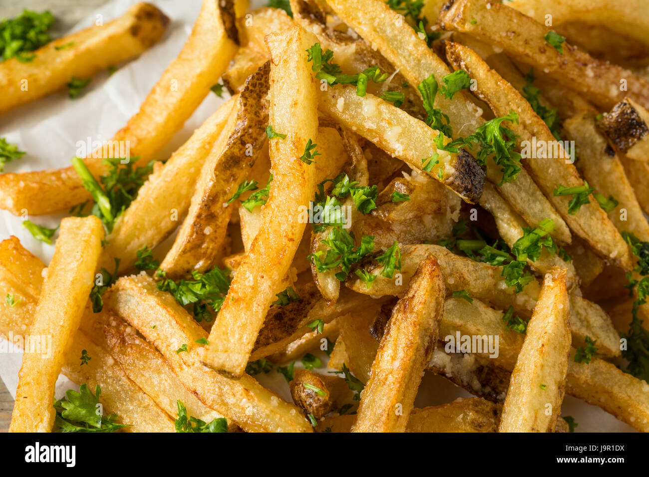 Homemade Parmesan Truffle French Fries with Parsley and Mayo Stock
