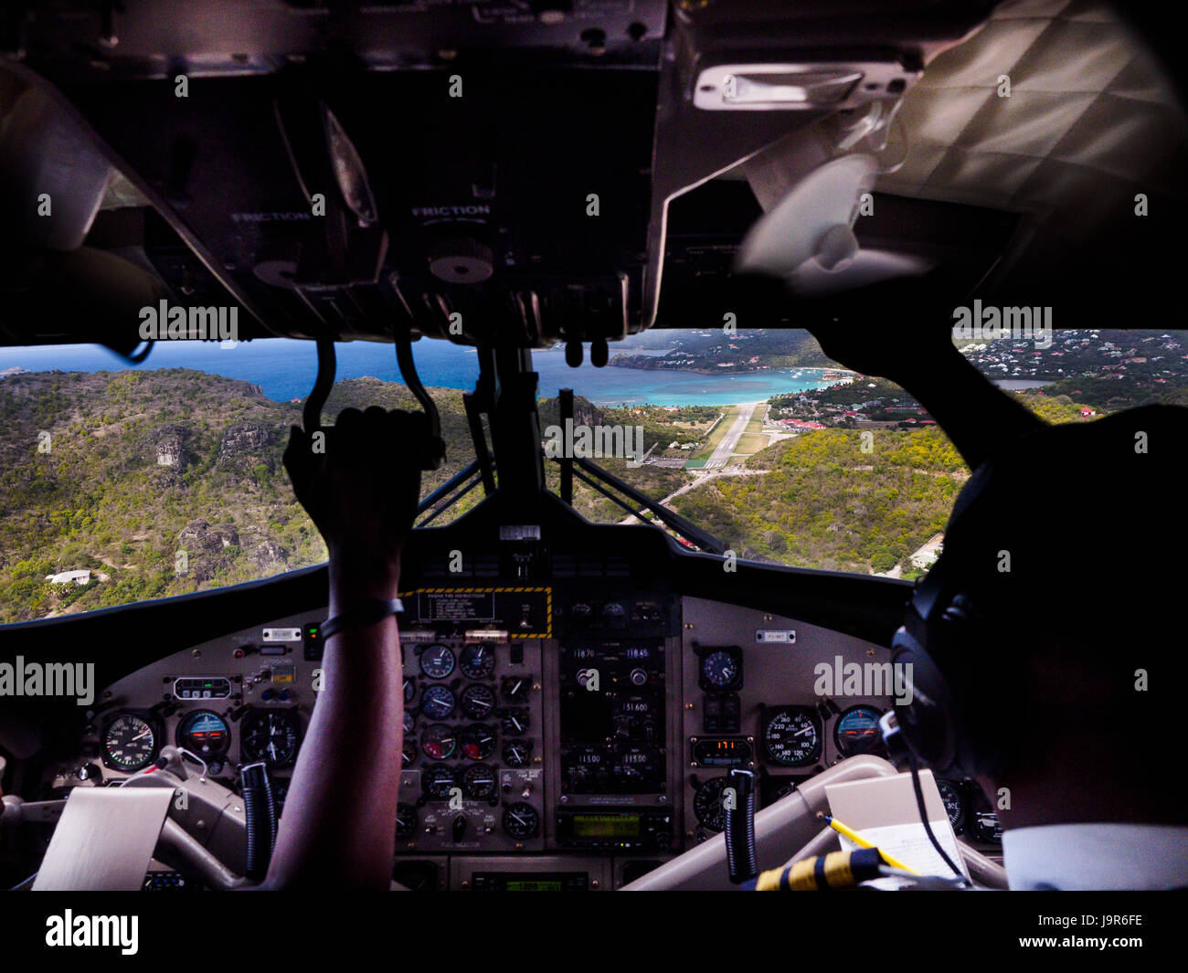 A scary approach and landing from a small plane on the runway of the