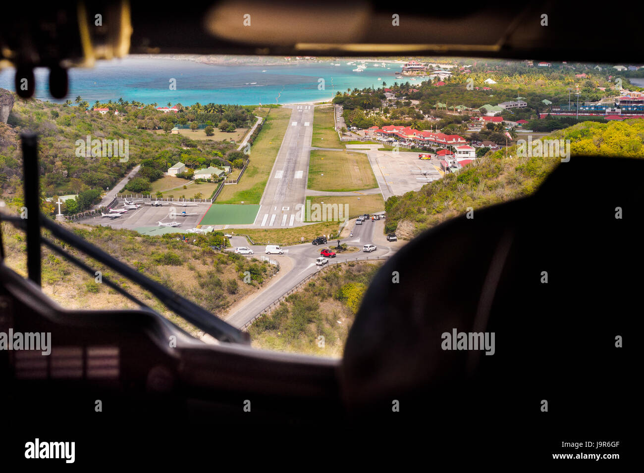 A scary approach and landing from a small plane on the runway of the