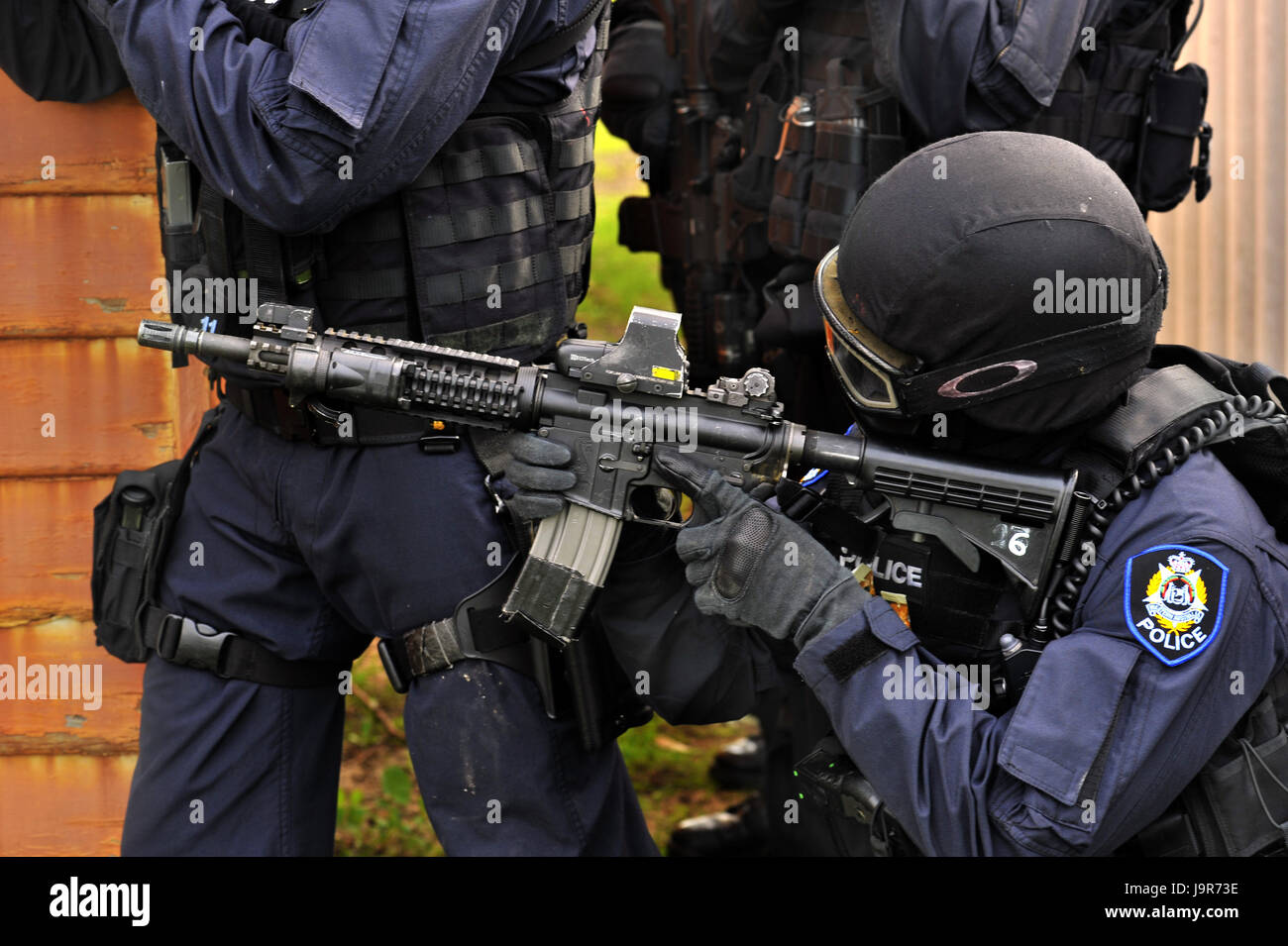 Western Australian Police, rapid response team in action, using laser sighted assault rifles. Stock Photo