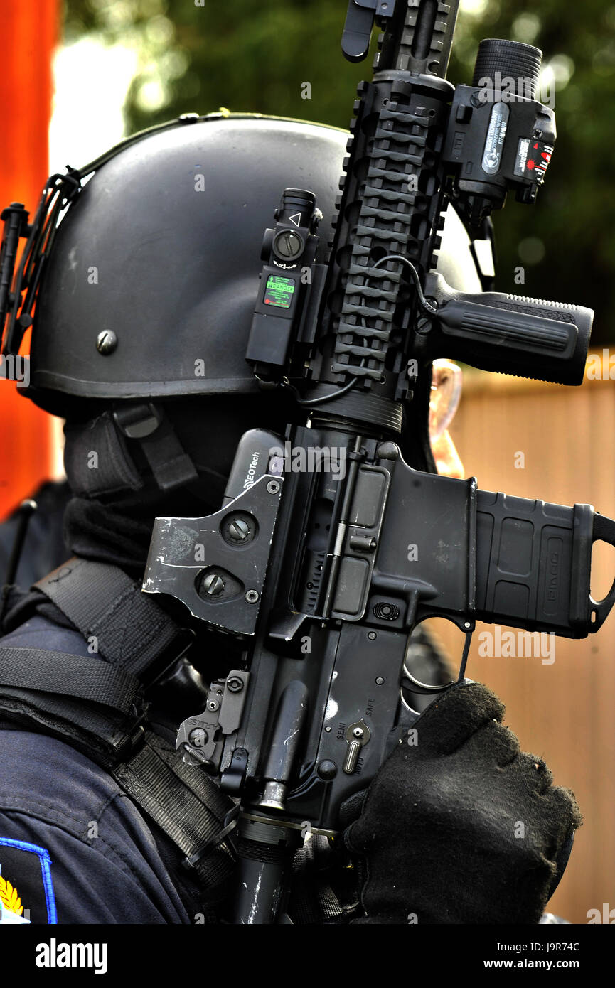 Western Australian Police, rapid response team in action, using laser sighted assault rifles. Stock Photo