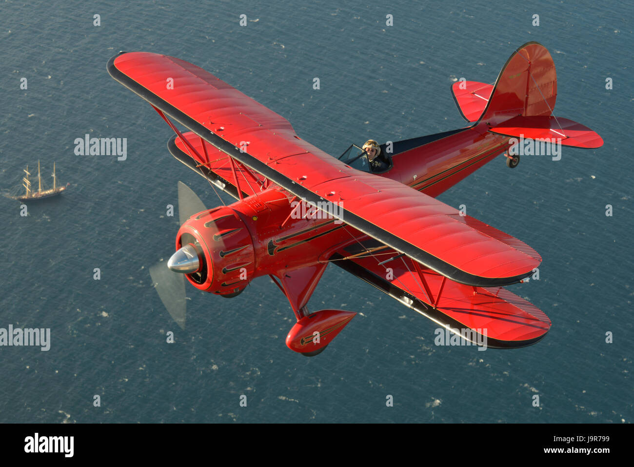 WACO YMF-5D new build period biplane photographed in the air-to-air (A2A) environment, over Perth's northern beaches. Stock Photo