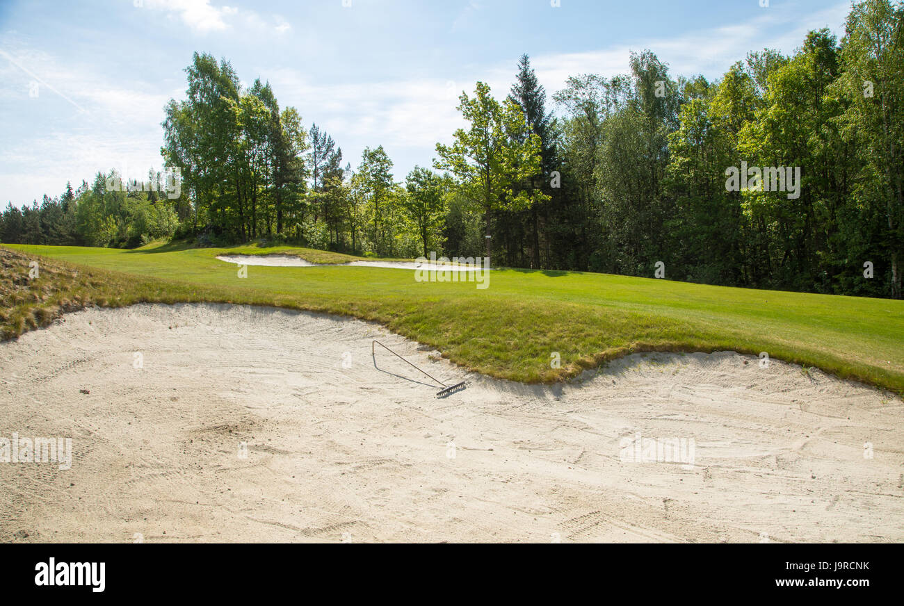 Raking sand bunker hi-res stock photography and images - Alamy