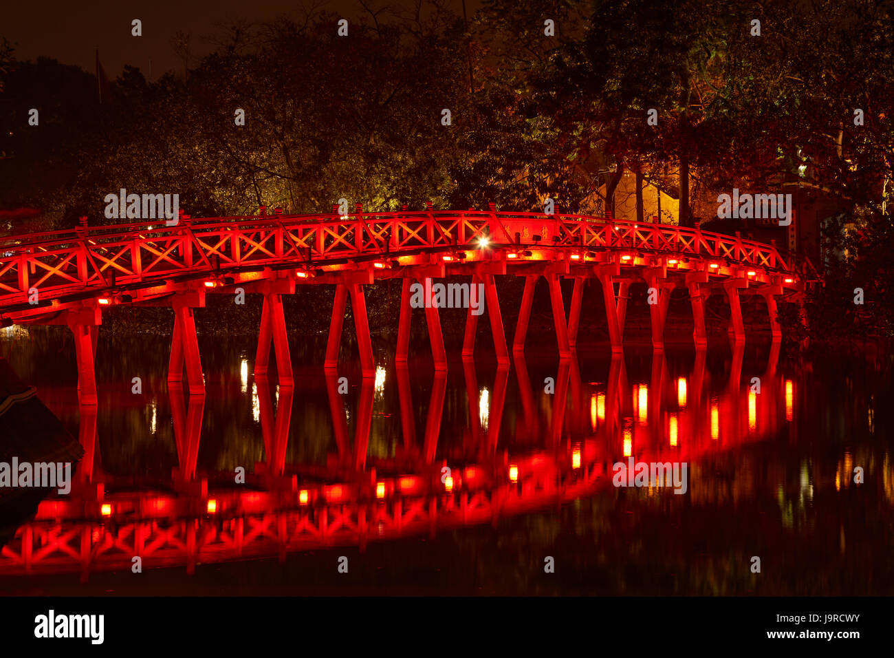 The Huc Bridge to Jade Island at night, Hoan Kiem Lake, Hanoi, Vietnam Stock Photo