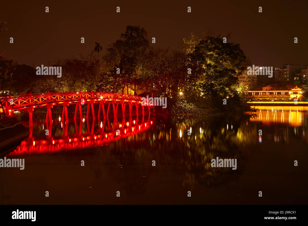The Huc Bridge to Jade Island at night, Hoan Kiem Lake, Hanoi, Vietnam Stock Photo