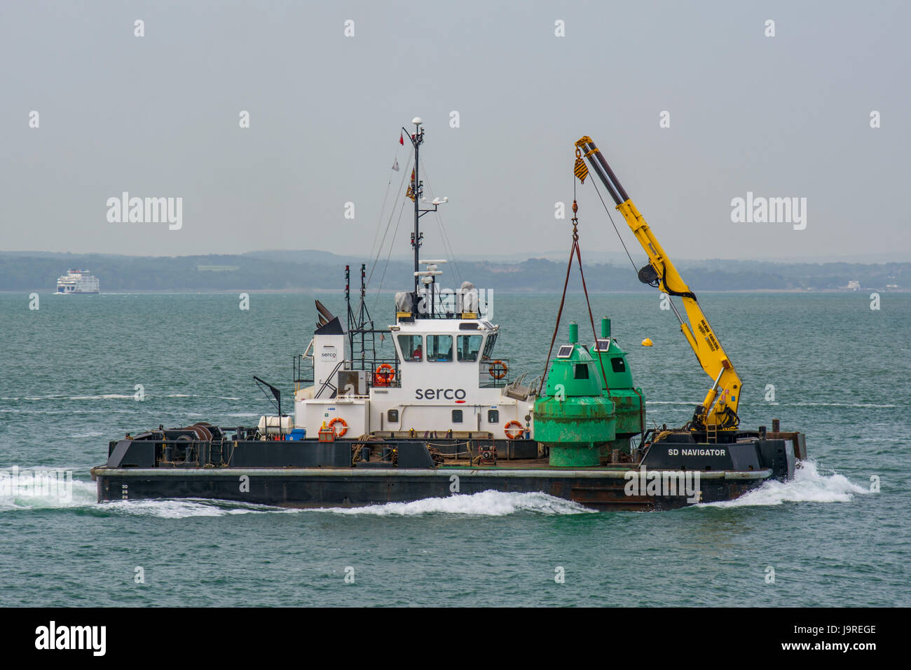 SD Navigator returning to Portsmouth with two navigation buoys. Stock Photo