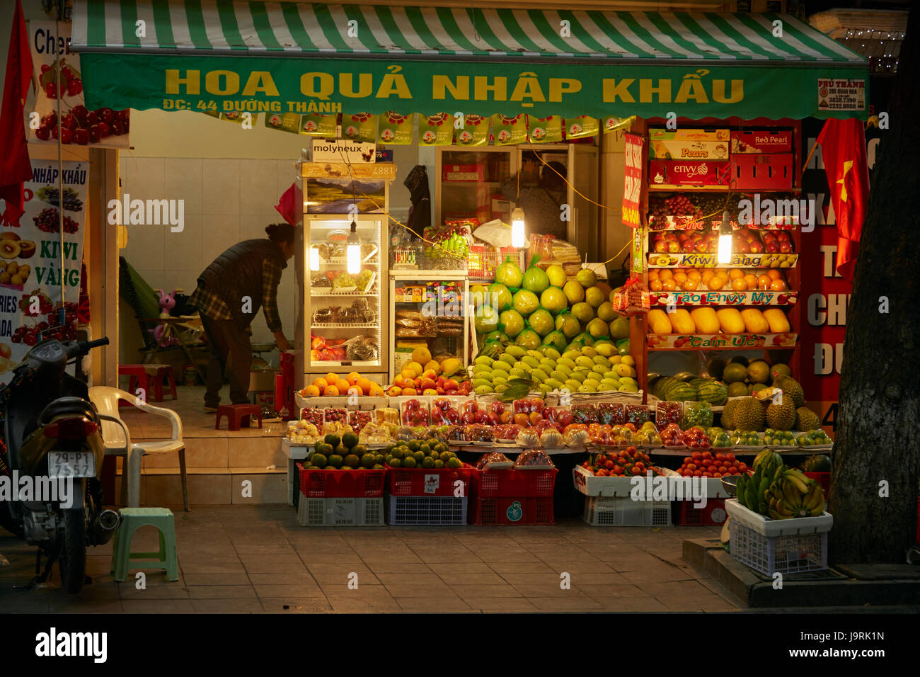 Fruit shop at night, Old Quarter, Hanoi, Vietnam Stock Photo